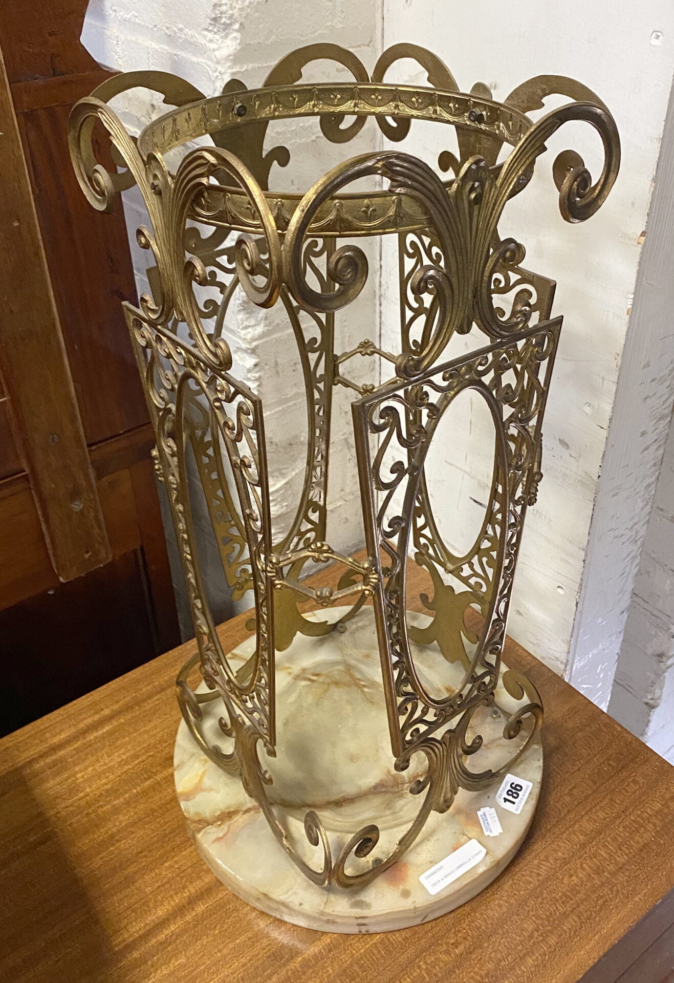 ONYX & BRASS UMBRELLA STAND Southgate Auction Rooms
