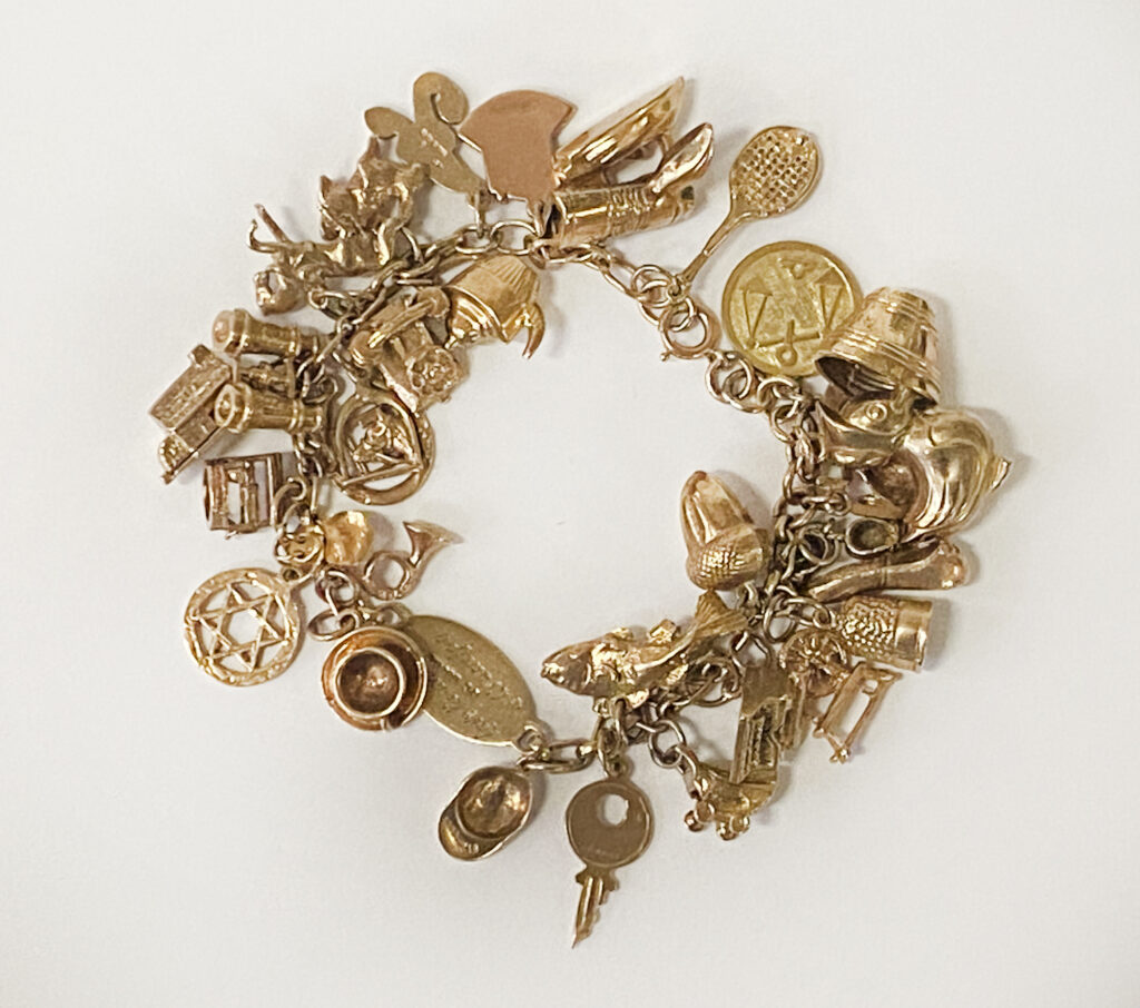 9CT GOLD CHARM BRACELET APPROX 51.1 GRAMS Southgate Auction Rooms