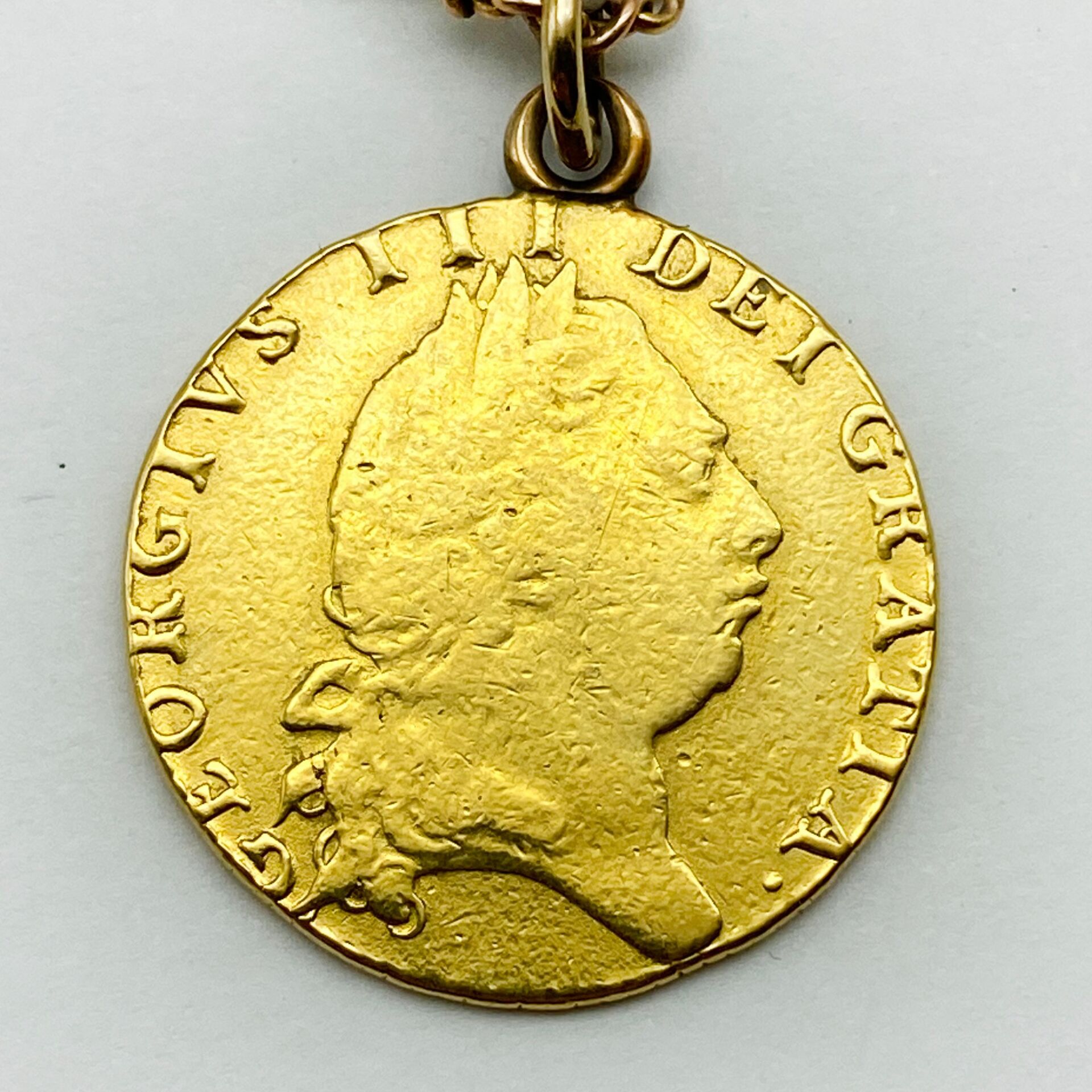 george-3rd-guinea-with-a-9ct-gold-chain-southgate-auction-rooms