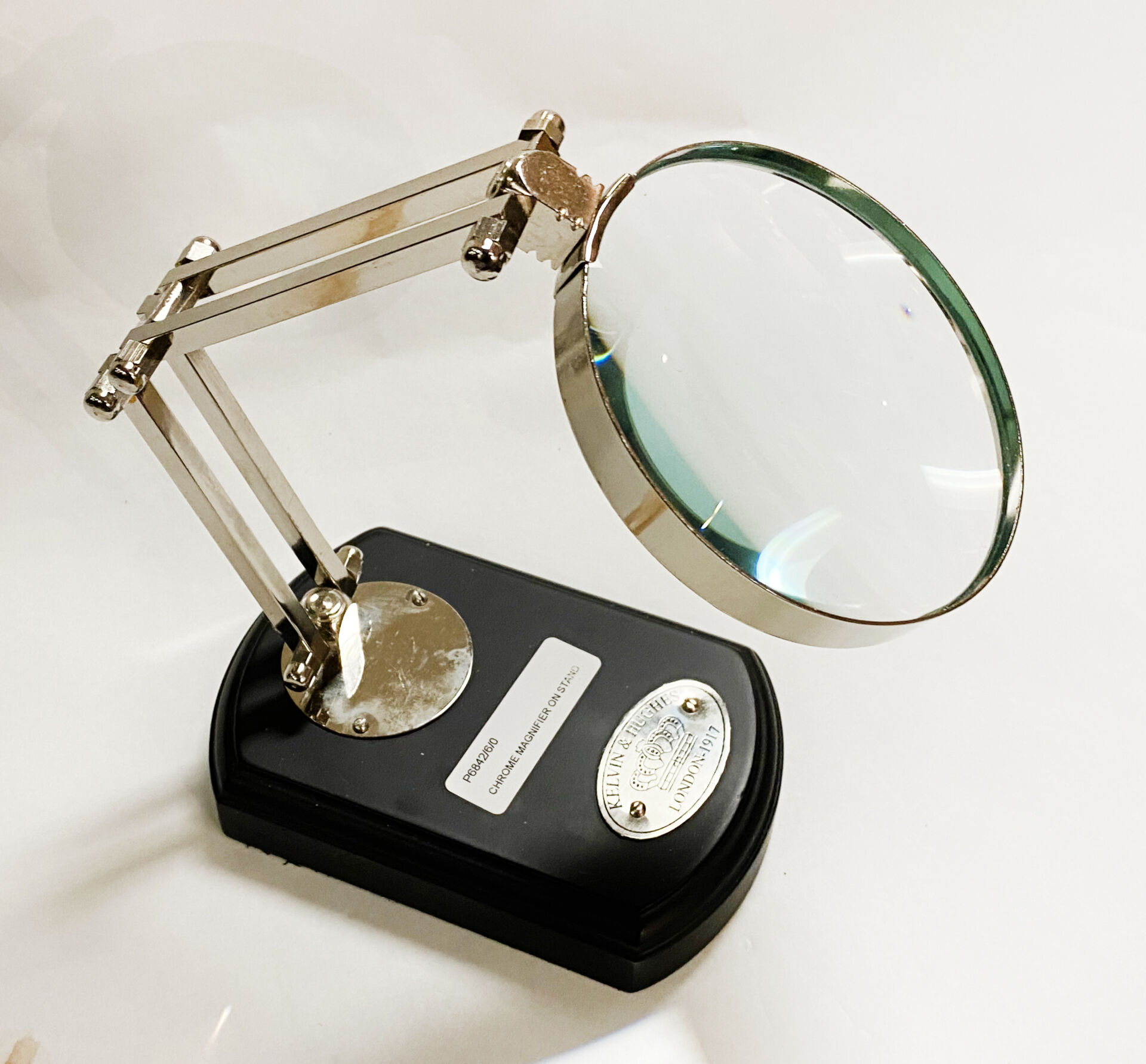 CHROME MAGNIFIER ON STAND Southgate Auction Rooms