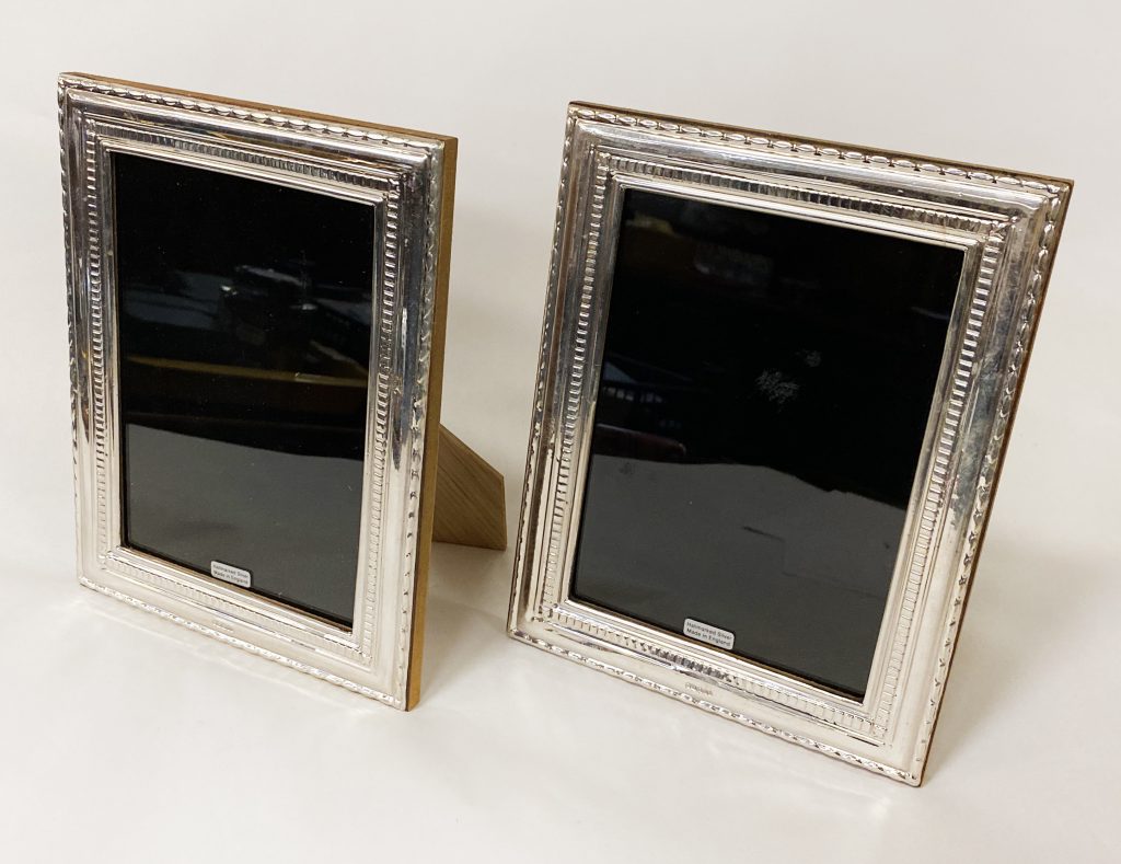 PAIR OF SILVER PHOTO FRAMES - INNER FRAME 17CMS (H) X 12 CMS (W) APPROX ...